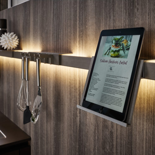 alt="Close up of DOMO niche shelving with insertable module and inset LED lighting"