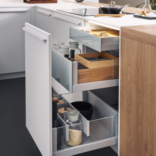 alt="Side view of open drawer with BONDI lacquer showing drawer organization and pullouts with Q-Box interior system"