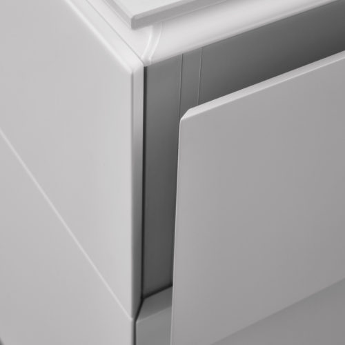 alt="Close up of kitchen island corner showing CLASSIC-FS matte-lacquer with grip handle drawer"
