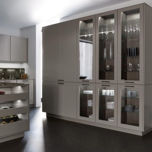 alt="Matte-lacquered framing of full cabinet with partial glass fronts"
