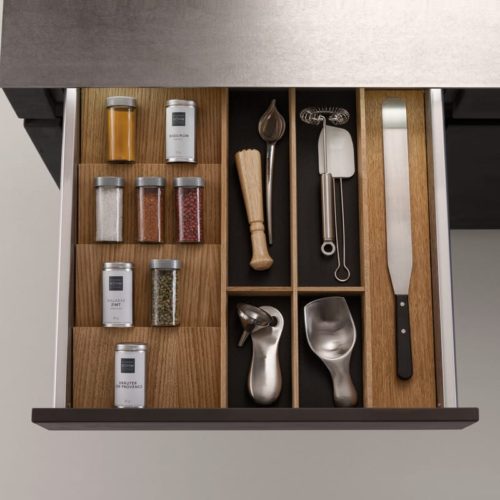 alt="Oak Q-Box drawer system with space for spices and cooking utensils"